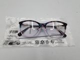 a pair of glasses on a plastic bag on a table