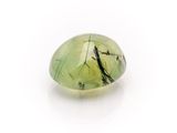 green tourmaline gemstone on a white background