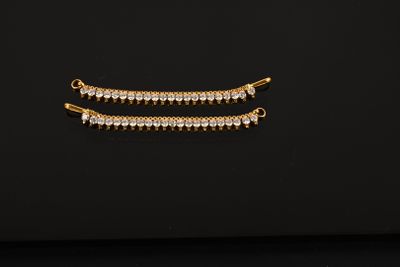Paire d'éléments décoratifs en or jaune 750/1000ème - Élégance intemporelle