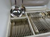 silverware in a box with spoons and spoons in it