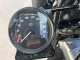 a close up of a motorcycle with a speedometer on it