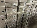 boxes stacked on top of each other in a warehouse