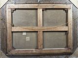 a picture of an old window with a rope hanging from it