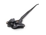 a black pipe with a black handle on a white surface