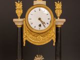 a clock that is sitting on top of a table
