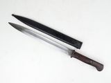 a knife on the table next to a knife on the table