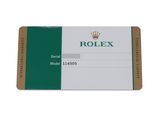 a close up of a green and white business card on a white background