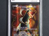 the pokemon card is in a plastic holder on a black surface