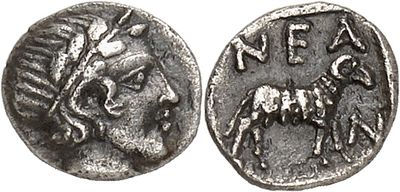 a silver coin with an image of a man and a horse on it