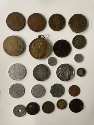 a lot of old coins on the table