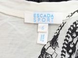 the back of a white shirt with a black and white design on it