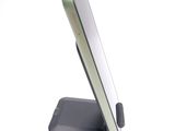a cell phone that is sitting on top of a stand