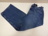 a close up of a pair of jeans on a table