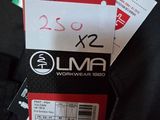 the back of a pair of black pants with a red and white tag on it