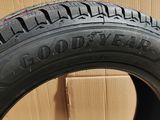 a close up of a tire with a box in the background