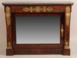 an image of a mirror sitting on top of a wooden table