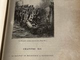 un livre ouvert sur lequel figure l'image d'une ville