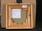 a picture of a picture in a box on a table