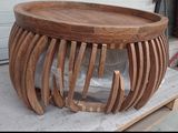 a wooden table with a glass bowl on top of it