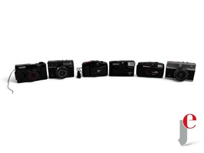 five cameras that are lined up in a row