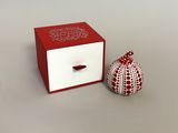 a red and white box with a white lid and a red and white box with a white lid