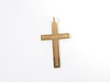 gold plated cross on a white background with a bead around the edge