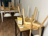 many chairs that are lined up in a room
