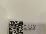 a sticker with a qr code on it sitting on a table