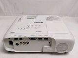 an image of a white projector sitting on top of a white table