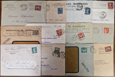 many different types of letters and envelopes laid out on a table