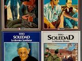 four books of spanish literature are on display in a store window