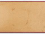 a close up of a piece of paper with a pink border