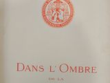 an old book with a red seal on it