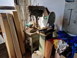 a picture of a room filled with lots of wood and tools
