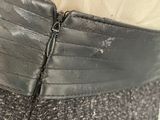 an image of a close up of a belt on a woman ' s waist