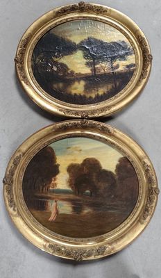two oval paintings of trees and a lake in a gold frame