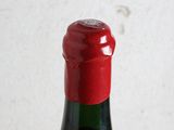a bottle of wine that is sitting on a table