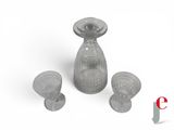 three glasses and a decanter sitting on a table