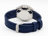 the watch is on a blue strap with a silver buckle