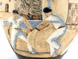 an image of a vase with a painting on it