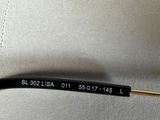 a close up of a pair of wires connected to a white wall