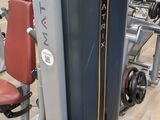 a machine that is sitting on the floor in the gym