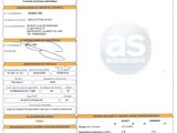 a paper with a picture of a car ' s license on it