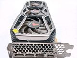 a close up of a video card sitting on top of a white surface