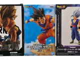 dragon ball z action figures are on display in a store