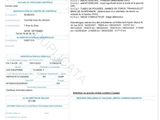 a white and blue document with a picture of a person on it
