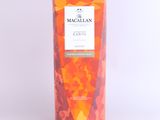 a close up of a bottle of macallan earth on a white background
