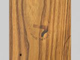 a close up of a piece of wood with a hole in it