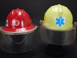 two hard hats that are sitting next to each other
