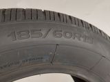 a close up of a tire on a white surface with a white background